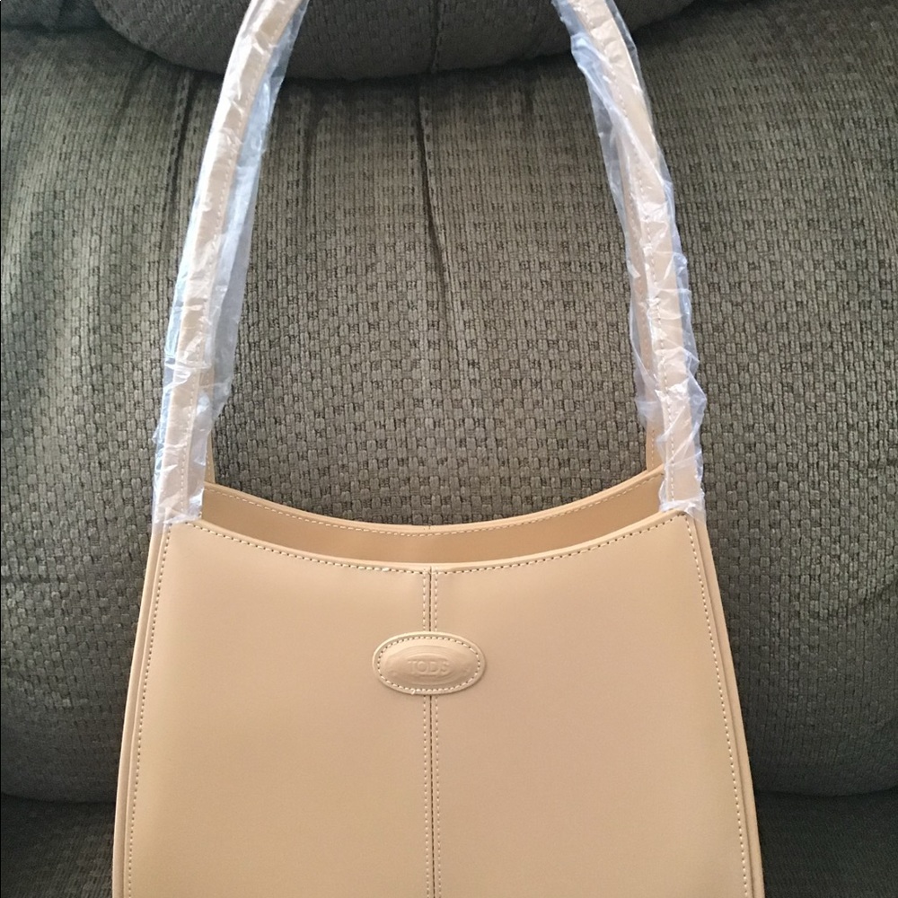 Tod’s Cream colored tote purse New
